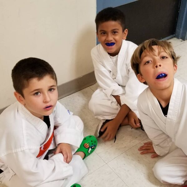Noah, Sebastian and Isaac waiting to be called for categories 9, 8 and 7 year old for #kumite and #kata competition at Tournament of Legends #miami@timeoutkarate #ninjalounge #dezerlandpark #karate #wado